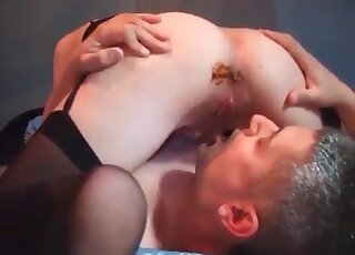 Woman being on top of a man who has a scat kink