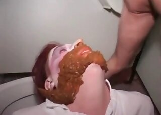 Hairy asshole is shitting directly on the redheaded MILF