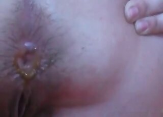 Asshole opening and closing in this amateur scat show